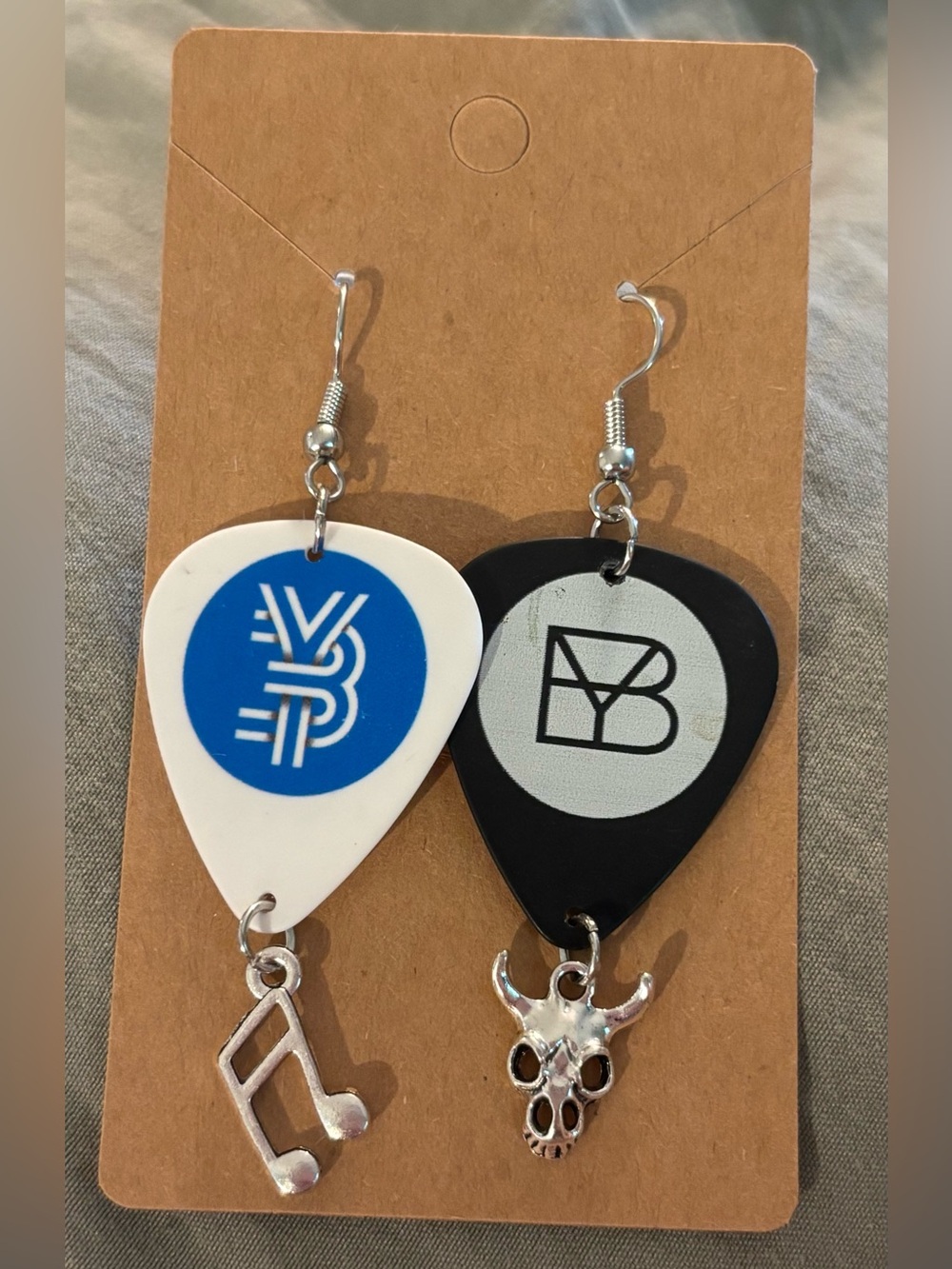 Hand Crafted Brett Young white & Black Guitar Pick Earrings with Silver Charms.